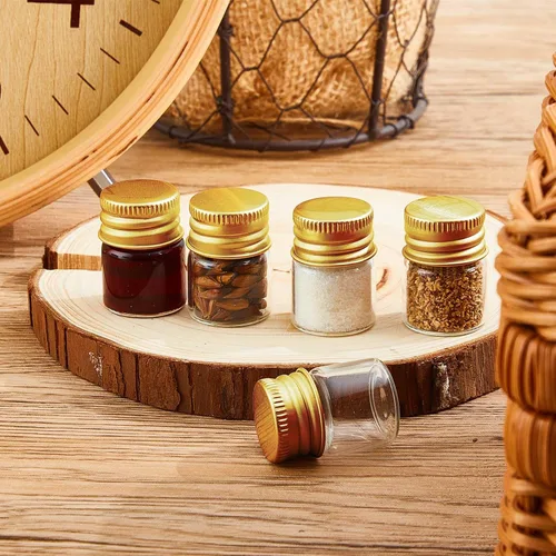 Vista 4 de Tessco for you 100 piezas botellas de vidrio mini de 5 ml (0.17 onzas líquidas) con tapa de aluminio, frascos pequeños, frascos de vidrio mini Dorado