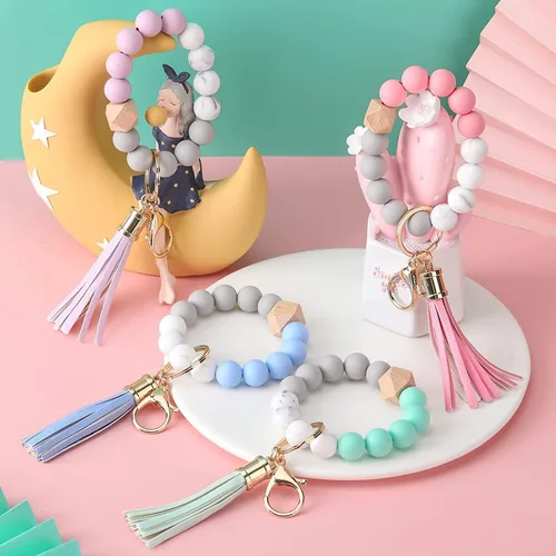 Vista 2 de Llavero de pulsera para mujer, de silicona, con cuentas y soporte para tarjetas, con cuentas elásticas