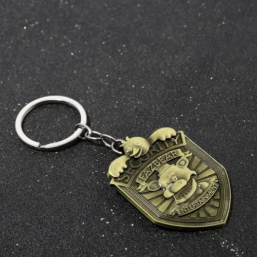 Vista 5 de FNAF - Insignia de guardia de seguridad Pin de guardia nocturno de Freddy Fazbear Regalos de disfraz de la FNAF para niños, hombres, mujeres