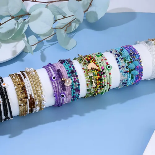 Vista 3 de Florideco Cuentas de cintura de 27.5 a 50 pulgadas para mujer, joyería africana en capas para el cuerpo en cuentas elásticas coloridas para mujer