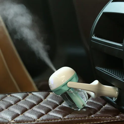 Vista 2 de Humidificador de purificador de aire de coche y aromaterapia Mini cargador de coche Puerto portátil humidificador de niebla fría con aroma difusor