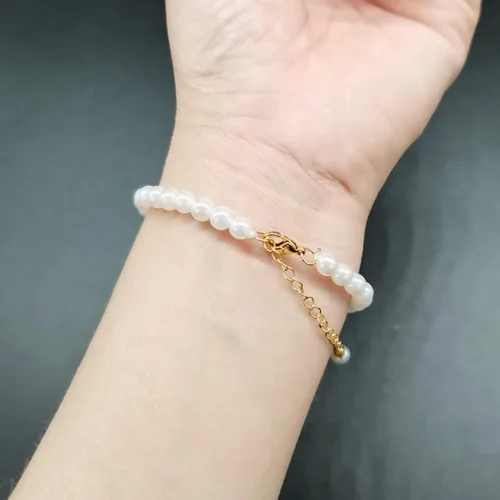 Vista 8 de Pulsera redonda de perlas blancas de 0.236 in para mujer, pulseras de perlas de concha simulada, accesorios de boda, regalo de joyería ajustable