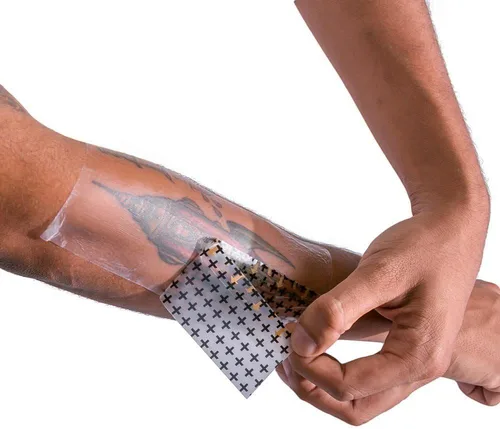 Vista 5 de Recovery Derm Shield - Rollo de vendas para el cuidado posterior de tatuajes, adhesivas, transparentes e impermeables