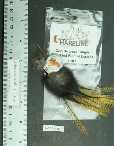 Vista 5 de Hareline Fly Tying Coq De Leon Feathers for Dry Fly Tails, Nymphs, and Euro Patterns Barrado moteado Aconchado
