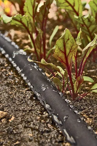 Vista 3 de Rocky Mountain Goods – Manguera de agua plana para riego de plantas y flores – diseño de doble capa resistente – ahorra un 70 % de agua – goteo