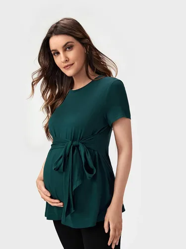 Vista 3 de OYOANGLE Camisetas básicas de maternidad para mujer, con lazo frontal, manga corta, cuello redondo, peplum