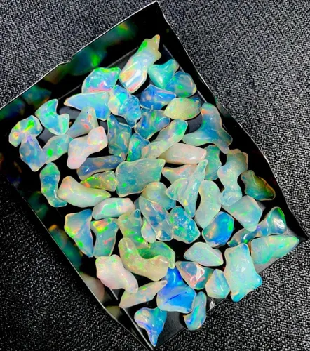 Vista 2 de Rare Gemstone Piedras preciosas de ópalo etíope en bruto, forma desigual, múltiples fuegos, ópalo etíope, joyería suelta en bruto, 10 piezas