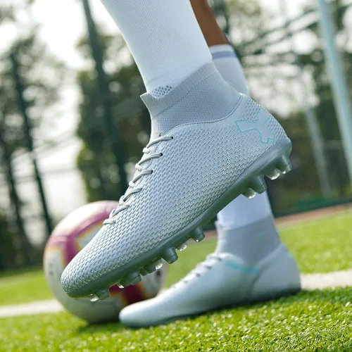Vista 7 de KouAzAz Tacos de fútbol para hombre y mujer profesionales con picos de caña alta, botas deportivas para interiores y exteriores, zapatos