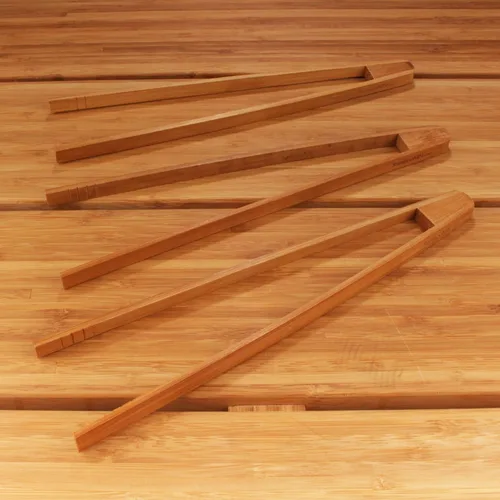Vista 3 de BambooMN - Pinzas reutilizables de bambú "A" para tostadas de 7.9" - Marrón carbonizado - 10 piezas