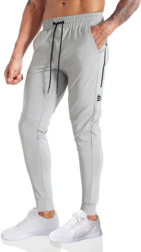 Vista 18 de BROKIG Pantalones deportivos ligeros para hombre, elásticos, de secado rápido, con bolsillos con cremallera