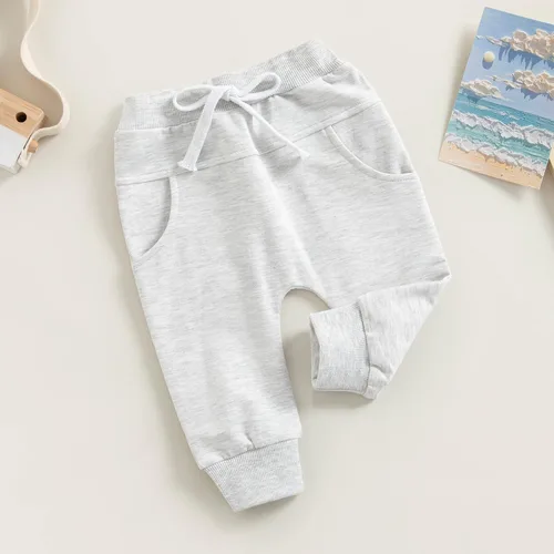 Vista 8 de Mubineo Pantalones deportivos básicos lisos para bebés, niños y niñas, cómodos pantalones de algodón con bolsillos