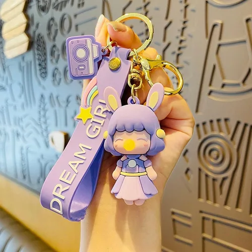 Vista 3 de Llavero kawaii con diseño de dibujos animados bolsa con colgante para decoración de mochila llavero de coche para niña y mujer