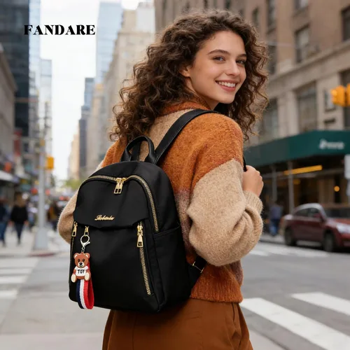 Vista 2 de FANDARE Mochila para mujer con dijes desmontables de piel sintética para laptop, Negro, Grande