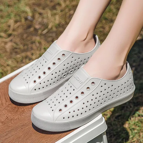 Vista 6 de FLIOZY Zuecos de jardín impermeables para hombres y mujeres, zapatos ligeros y transpirables de EVA sin cordones, cómodos y antideslizantes, calzado