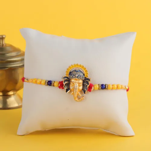 Vista 2 de Ganesha Brass Rakhi para hermano Rakshabandhan ThreadRaksha Bandhan Rakhi