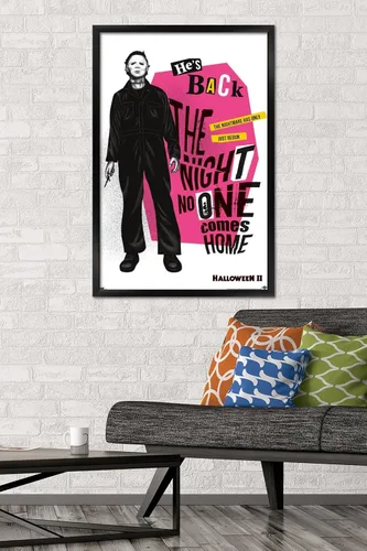 Vista 2 de Trends International Halloween II - Póster de pared con texto en inglés "He's Back", 22.37 x 34.00 pulgadas, versión enmarcada en negro Versión