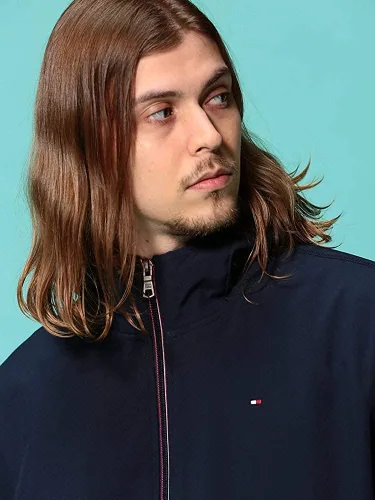 Vista 3 de Tommy Hilfiger Chaqueta Softshell ligera resistente al agua transpirable con capucha para hombre, Negro