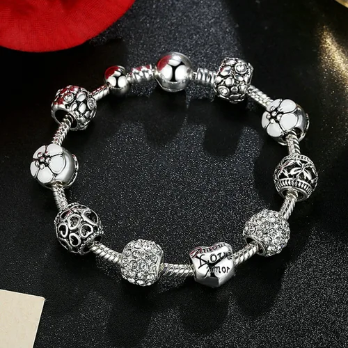 Vista 2 de Muerdou - Pulsera con dijes de mariposa y flor y cuentas de cristal de Murano para niñas y mujeres