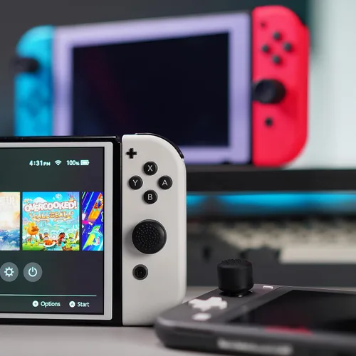 Vista 7 de eXtremeRate 4 pares de fundas negras de silicona antideslizante de longitud extendida para Nintendo Switch y Switch OLED Joy-con Controller, tapas