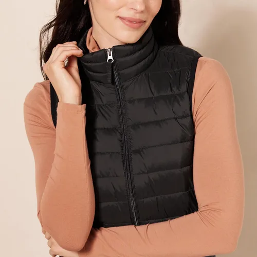 Vista 4 de Tienda Essentials - Chaleco para mujer, ligero, impermeable y fácil de guardar