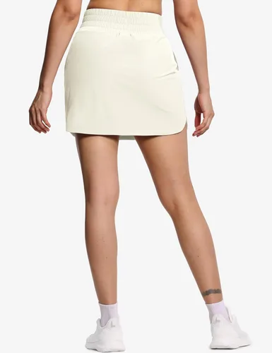 Vista 3 de THE GYM PEOPLE Falda pantalón de golf para mujer, de cintura alta, ligera, atlética, casual, pantalones cortos integrados con 4 bolsillos