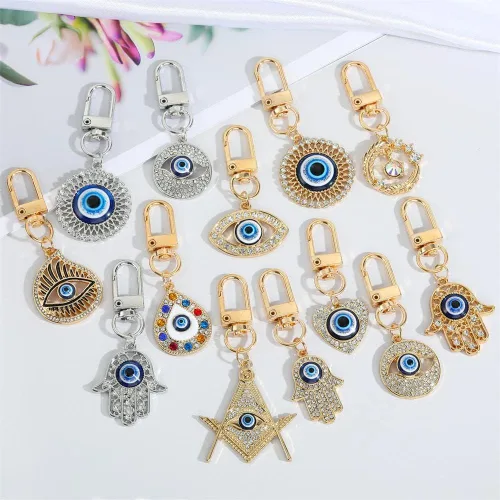 Vista 2 de Hamsa Llavero de mano con diseño de mal de ojo para coche, Cabalá, buena suerte, protección de paredes, bolsos, joyería