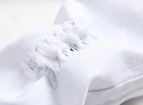 Vista 3 de Jeans ajustados para niño, elásticos, de aspecto desgastado y desgarrado