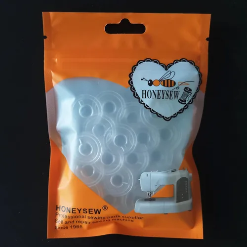 Vista 2 de HONEYSEW Bobinas de plástico transparente clase 15 para máquinas de coser cantantes (20 unidades/paquete)