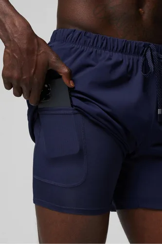 Vista 75 de Fabletics The One - Pantalón corto para hombre (forro), entrenamiento, natación, ligero, de secado rápido, bolsillo con cremallera, tejido elástico