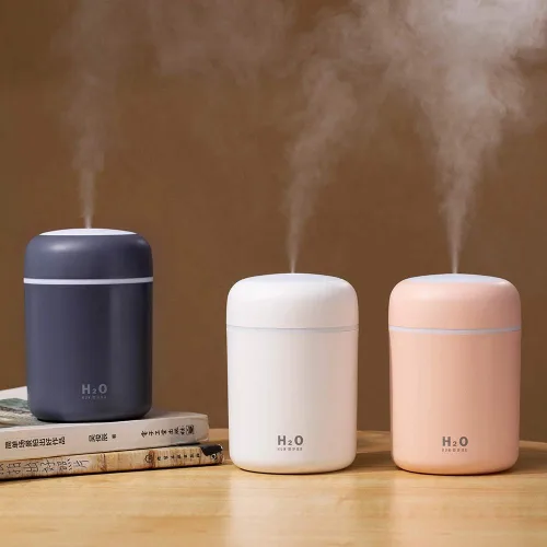 Vista 4 de Mini humidificador colorido y fresco, difusor de aceite esencial aroma, humidificador USB de niebla fría, 2 modos de niebla ajustables, súper