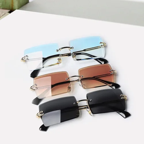 Vista 2 de Tskestvy Gafas de sol rectangulares sin montura para mujeres y hombres gafas de moda de los años 90 accesorios Y2K