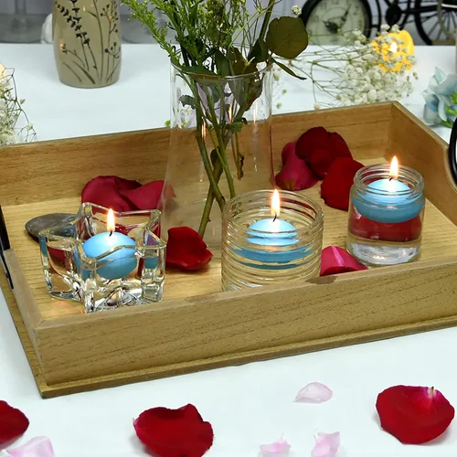 Vista 4 de Zest Candle Velas flotantes de 24 piezas, 1.75 pulgadas, azul claro