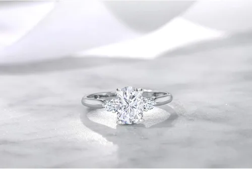 Vista 5 de 10K White Gold Forever Classic Created Moissanite by Charles Colvard and White Created Sapphire Women Solitaire Ring 160 Cttw Oval 8X6MM Available