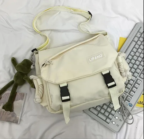Vista 9 de Bolso cruzado estético con bonitos pines y adornos, bolsa de mensajero de nailon para el hombro, bolsa japonesa Kawaii para mujeres y hombres