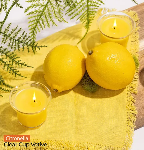 Vista 5 de HYOOLA Clear Cup Velas votivas perfumadas – Citronela – 12 horas de tiempo de combustión – Paquete de 4 – Fabricado en Europa Amarillo Citronela