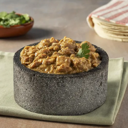 Vista 2 de Isadora Chile Verde de cerdo totalmente cocido, bolsa de 15 onzas, comida mexicana auténtica lista para comer, cerdo en salsa verde, calor medio