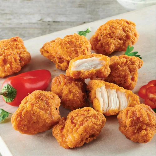 Vista 3 de Just Bare® Pechugas de pollo ligeramente empanadas y picantes Totalmente cocinadas 16 G de proteína Congeladas 1.50 LB