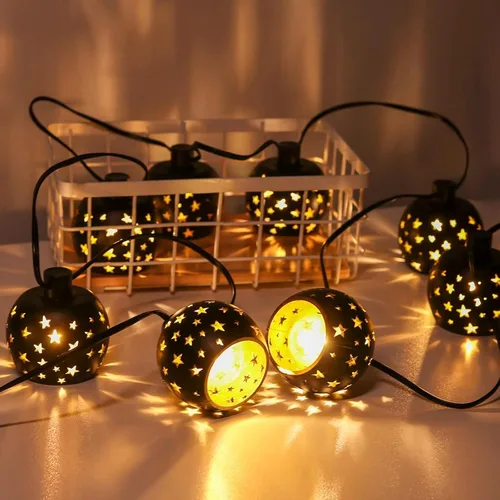 Vista 3 de Vigdur Guirnalda de luces tipo farol, tira de luces de estrella enchufable con 10 bombillas G40 transparentes y pantallas de plástico de estrella