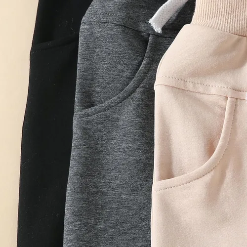 Vista 5 de Paquete de 3 pantalones deportivos básicos lisos y suaves de algodón de color liso, pantalones de algodón para otoño e invierno