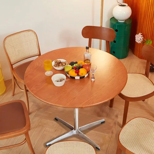 Vista 3 de Mesa de comedor redonda moderna de madera maciza con base de metal cruzada, mesa pequeña de madera marrón para oficina, mesa de centro pequeña