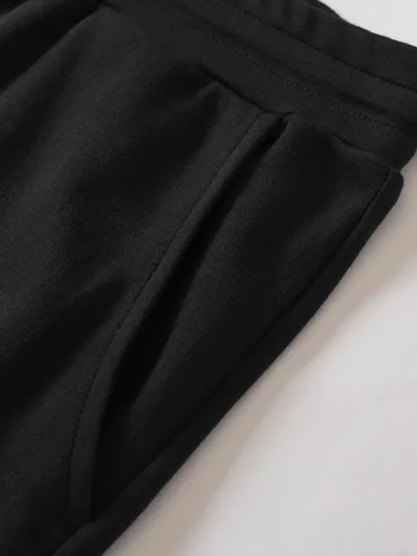 Vista 4 de Weintee Pantalones de punto con cordón y bolsillos para mujer de talla grande