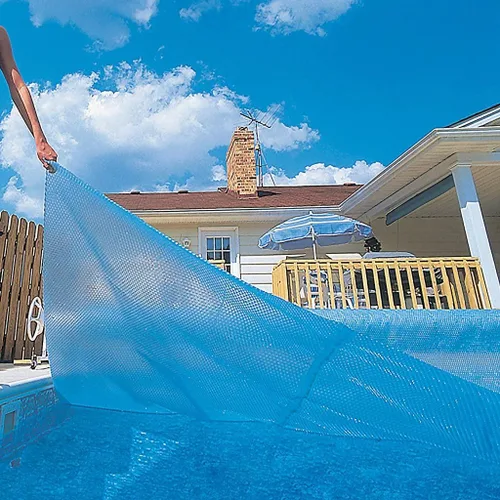 Vista 2 de Blue Wave NS400 mil Manta solar para piscinas rectangulares de 12 x 20 pies en el suelo - Azul