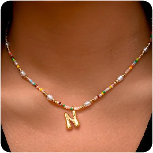 Vista 34 de Ritach - Regalos de Navidad para nietas, adolescentes y niñas, collar con inicial de perlas de colores claros, collar con dije de burbuja dorada